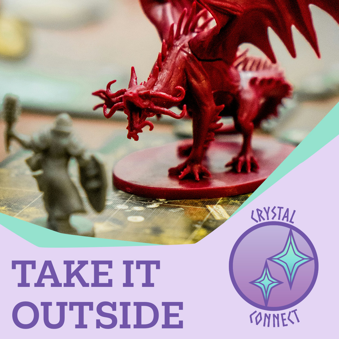 A small knight figurine approaching a red dragon figurine on top of a game board. The text says 'Take it outside.'